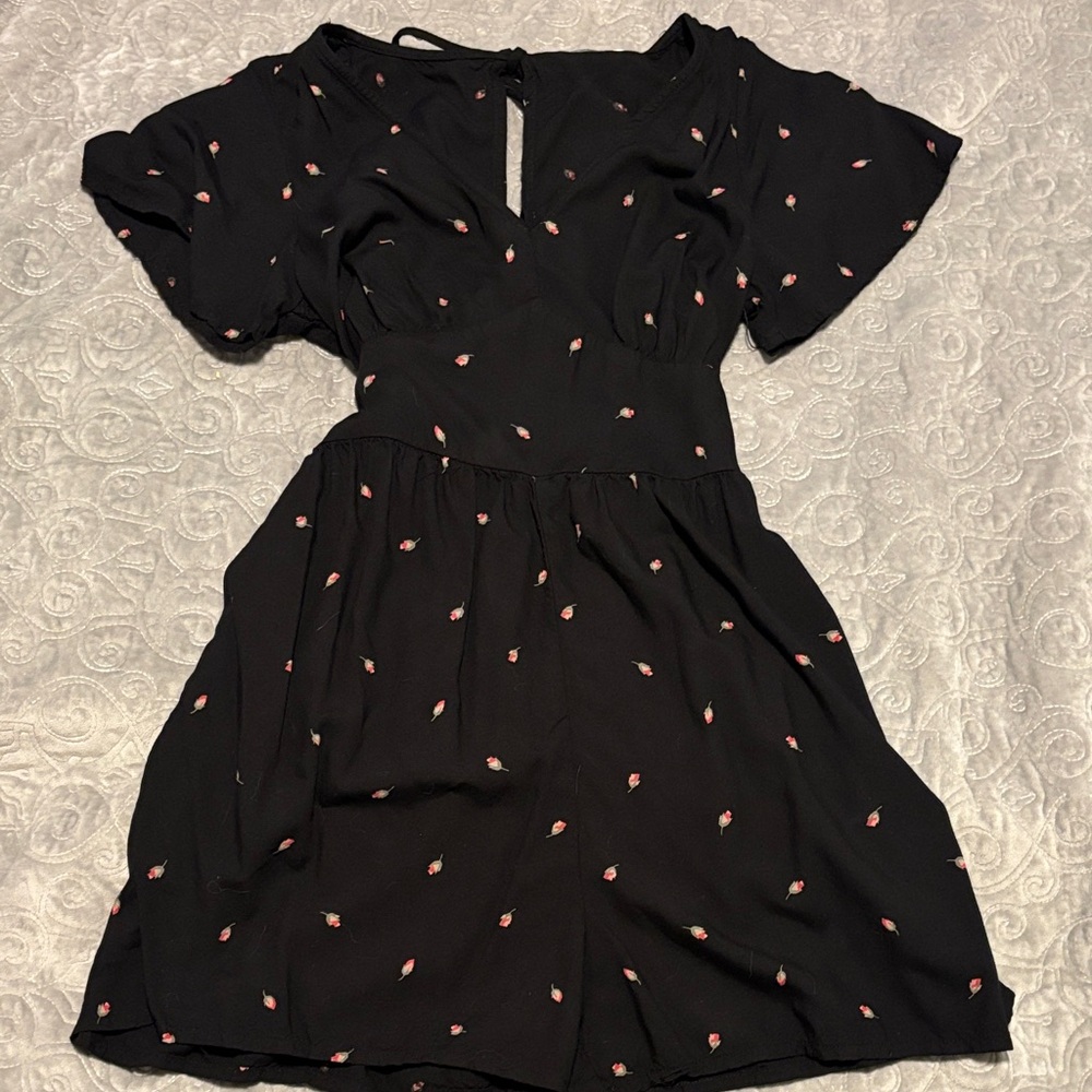 Elegant Black romper with Subtle Pink rose Accents